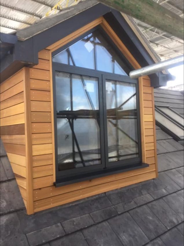 Cedar-clad dormer window
